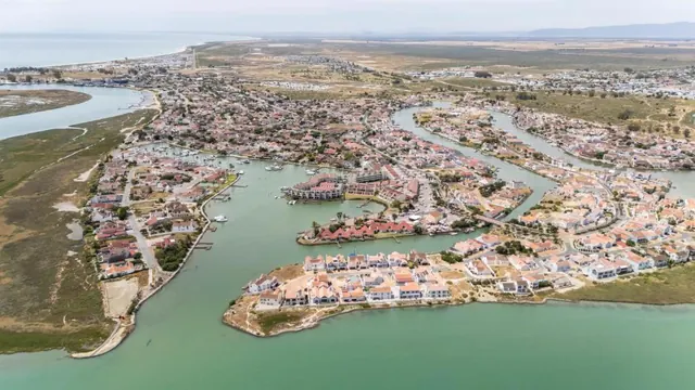 Aerial view of Port Owen's marina canals, with the Berg River estuary and the Atlantic beyond